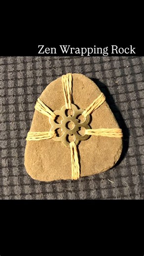 Shogo Zen Art 🎨 on Instagram: "Zen Rock wrapping, also known as wrapped rocks, is a beautiful and meditative practice that transforms simple stones into stunning works of art. Each rock is meticulously wrapped with string, twine, or leather cord, creating minimalist and symmetrical designs that bring a sense of calm and tranquility. 🪨❤️ Not only are these wrapped rocks perfect for decorating your space or serving as unique centerpieces, but they can also enhance your meditation practice. Each 