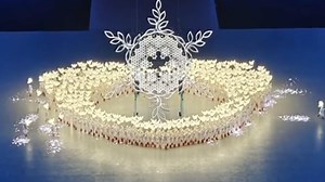 The giant snowflake-shaped cauldron at the Beijing 2022 Winter Olympics was without a doubt a surprise twist. It was designed by Chinese visual effect artist Wang Zhi'ou and his team. It is actually a large snowflake made of more than 90 small snowflakes in the shape of Chinese knots. The device was decorated with 550-thousand lights on it and was digitally programmed. #TheVibe #ArtisticAces | China Plus Culture
