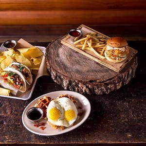 Get into your favorite Twin Peaks today and experience the ultimate lodge mantality by indulging in one of our new menu items. Try the Southern Fried Chicken Sandwich, the Nashville Hot Chicken Sandwich, Loaded Tots, Potato & Egg Tacos or Chicken & Waffles. | Twin Peaks Restaurants