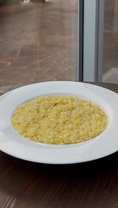 🌟 Golden, creamy, and irresistible — Saffron Risotto is the heart of Italian comfort food! Ready for a tasty cuddle?🍚💛✨ Mattia's Table Ingredients (serves 2 people): 1 cup arborio rice (200 g) 1 glass white wine (about ½ cup / 120 ml) 1 g saffron flowers 1 shallot 2 tablespoons butter ½ cup shredded Parmigiano-Reggiano 1 onion 2 carrots 1 stalk celery 1 bunch parsley 1 tomato Salt and pepper, to taste 8½ cups water (2 liters) Preparation: Make the Broth: Clean and chop the onion, carrots, cel