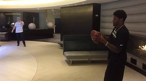 Lamar Jackson and Hayden Hurst are getting to know each other playing some catch in the hotel lobby. | Baltimore Ravens
