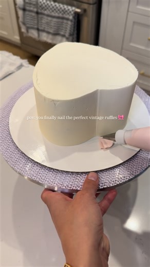 Vintage Cakes | Guelph Cakes on Instagram: "Honestly, my big secret for perfect ruffles is the buttercream 🎀 Your buttercream has to be silky smooth! A ruffle skirt is one of the prettiest ways to dress up a vintage cake, but getting it right can feel like a constant struggle. 👉🏽Start with the buttercream itself - If your base isn’t silky smooth, nothing else will fall into place - no matter how steady your hands are or which piping tip you’re using. Buttercream is everything. Too stiff and y
