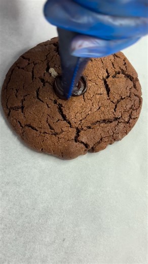 3.1K views | Ft the blooper﫣 Our Yule Log 蝹 A rich chocolate base cookie with Black Forest Icing and a vanilla buttercream swirl. Topped with golden sprinkles for that extra crunch ⛄️A Christmas must  You can now place your orders for January… It might be early but technically when it arrives it’s free沈 Girl math. #cookies #christmas #reel #reelexplore | Dipp'd Cookies & Brownies | Facebook