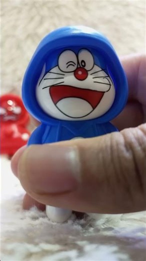 Face Changing Cartoon Characters Keychains 😍 #cartoon #hellokitty #doreamon #toys #keychain #kids