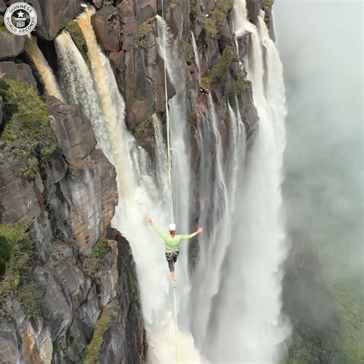 Six elite slackliners walked a 148m long highline suspended 1,008m above the iconic Angel Falls, the world’s tallest waterfall. | Guinness World Records