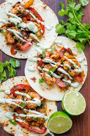 Homemade shrimp fajitas are a crowd pleaser and definitely don’t disappoint. Recipe: https://natashaskitchen.com/shrimp-fajitas/ | NatashasKitchen.com