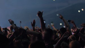 Premium stock video - Excited fans dancing at the concert