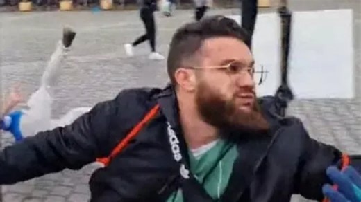 Man who killed cop at anti-Islam rally is dad who 'radicalised' in last year