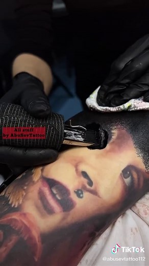 Tattoo Machine in Action: Professional Tattooing Process
