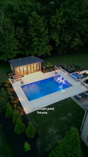 7.8K views · 726 reactions | Check out this backyard pool house with sliding glass doors that open right to the pool deck. Inside you’ll find a kitchen, fridge, TV, and even a full bathroom with a steam shower. Design + Build: @lawnscapescincy #luxury #outdoorliving #backyard #pool #landscaperenovation | WayUp Media | Facebook
