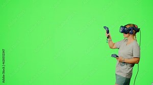 Design artist VR headset drawing picture in virtual reality creativity game. The woman in virtual reality paint imagination picture on chroma key green screen. Concept virtual reality art design game