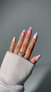 Cute girly nails inspired by the viral christmas cookie !! 🎀❄️✨ saw @abe.nailbabe use this technique & had to give it a try using @gelcare.official • Rose BB Creme • Hibiscus Latte • Polar Mist • Watermelon • French Alps code glossytipped to save✨* pearls & moissanite ring linked on my amazon under the photo of this look
