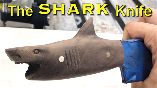 Carved wooden shark handle knife made out of an old rusty file
