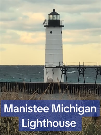 Standing at 39 feet tall, the Manistee North Pierhead Lighthouse was built from cast iron in 1872. The pier and its elevated catwalk were used by the keepers to keep the light in running order. This lighthouse is a welcoming sight to all boaters entering the Manistee River from Lake Michigan. Many fisherman love to fish off this pier or along the channel, which is an active area for freighters #manisteemi #lighthouses #michigan #followme #fishing