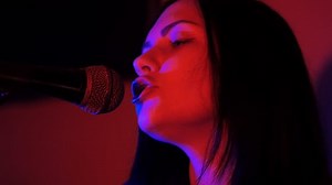 Young Beautiful Woman Sings Song Microphone Stock Footage Video (100% Royalty-free) 25053764 | Shutterstock