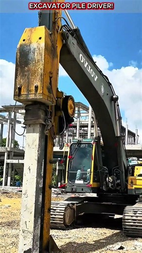 Excavator Pile Driving Attachment in Action.