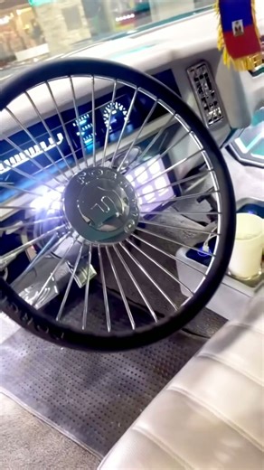 Candy teal 71 Chevy donk on 26’s Forgiatos