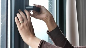 Download hand open gray plastic pvc window at home at early morning for free