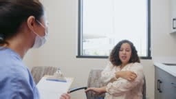 The unrecognizable female nurse practitioner listens carefully as the...