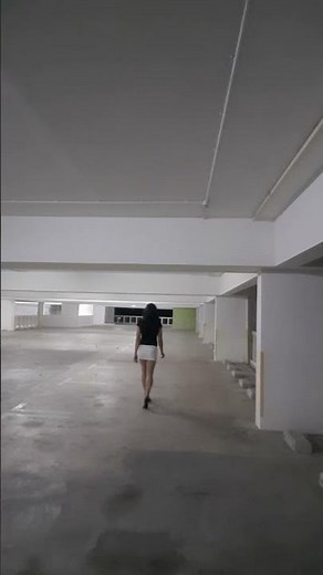 Crossdresser - Outdoor Walking in Black T-Shirt and White Mini Skirt