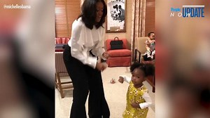 See Michelle Obama dance party with girl who admired her portrait