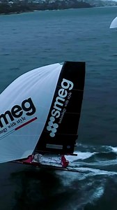 Boat speed of over 30 knots! Amazing last run to the finish line on Sundays Race. Smeg #2 rig verses Yandoo #2 rig with 2 reefs and storm jib - who can make this last gybe? For more, watch the race on https://www.18footers.com.au/18-footers-sailing/18-footers-tv/ This amazing footage is from AeroMedia -who else could get a drone up in rain and wind gusts of over 33knots! #highwind #adrenaline #drone #dji #international18skiff #18footersrace #sydneyharbour #fortheloveofsailing #sailinglife #saili