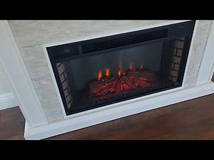 55" ledgestone mantle LED fireplace from costco or SEI Cumberland or canyon heights brands assembly