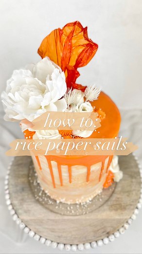 Dania | Cake Decorator on Instagram: "Instructions on how to make rice paper sails for cake decorations👇🏼 Step 1: Dye water (if desired). Step 2: Dip Vietnamese rice paper and soak until pliable (color will continue to deepens the longer it is soaked). Step 3: Arrange rice paper sail in desired shape, optionally using crumbled parchment paper or a pinned silicon mat for added texture (I do not recommend foil - the sails stuck to it when I tried peeling them off later). Step 4: Let air dry over