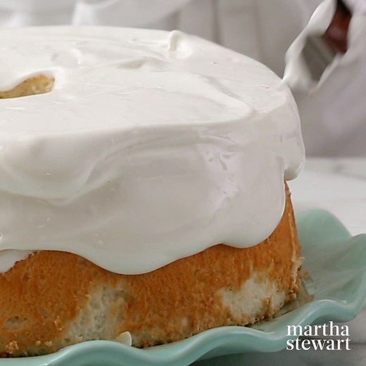 This light, flavorful dessert, filled and topped with seven-minute frosting and coconut, is a little slice of heaven. https://trib.al/gvL3LKP | Martha Stewart