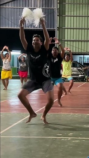 Men and women practicing Tahitian dance for a performance in French Polynesia