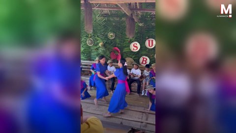 Fleet-footed girls tap dance on bamboo poles in the Philippines