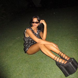 Dua Lipa's Towering Sky-High Platforms Are the Perfect Contrast to Her Lacy Minidress