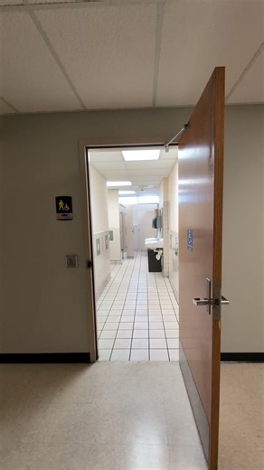 Exiting through the 1st Floor Men's Restroom Automatic Door at the Geology Building at WSU
