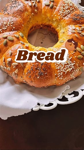 Laleh on Instagram: "✨A little taste of my bread artistry✨ Fluffy loaves, braided rolls, pumpkin buns, and festive wreath bread. crafted with care, baked with passion.🍞🧡 #HomemadeBread #BreadArt #beardlover"