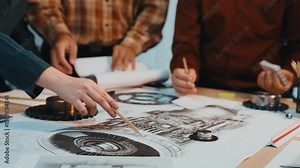 A group of professionals engaged in a collaborative engineering project, discussing technical drawings and blueprints on a table to develop innovative solutions. SACTR