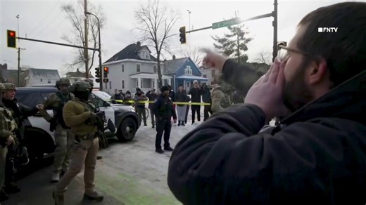 Angry protesters berate federal agents at Minneapolis shooting scene