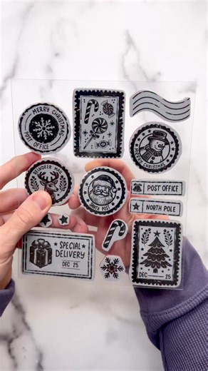 Simon Hurley on Instagram: "These adorable Christmas Postage stamps make the PERFECT easy DIY Christmas cards!🎅🏼 Leave a comment with the word “santa” and I’ll send you the supply list to make this. I started by stamping and embossing the images from the Christmas Postage stamp set. Then, I watercolored the images in using several colors of Stellar Inks!❤️ To create the background, I stamped the Tartan Plaid background stamp on green cardstock in Ivy League ink for a tone-on-tone effect. This