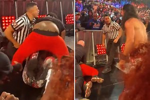 Watch shock moment WWE star Seth Rollins is attacked by FAN live on air