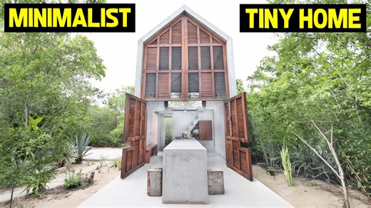 Two-story minimalist jungle retreat