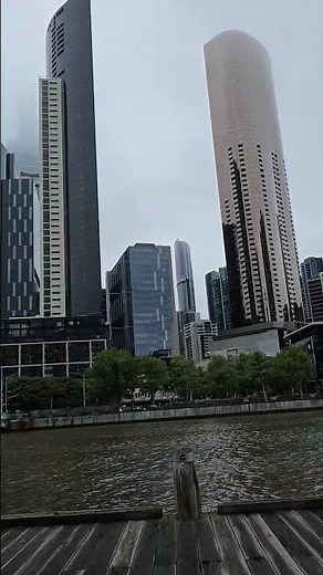 Melbourne aquarium and Enterprize Wharf with river and high rise buildings