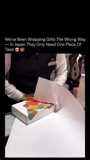 Keval Bhuva on Instagram: "This Japanese gift-wrapping technique turns a single piece of tape into a perfectly sealed package through precision, geometry, and muscle memory. 🧠🎁 Instead of relying on layers of adhesive, the wrapper uses exact folds and tension to lock the paper onto itself. Each crease redistributes force, creating friction and structural hold so the box stays closed without extra tape. The method comes from a culture that values efficiency, presentation, and respect for the ob