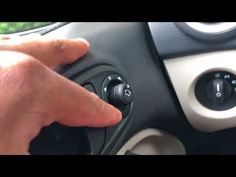 FORD FIESTA - Side view mirror controls and how to use them