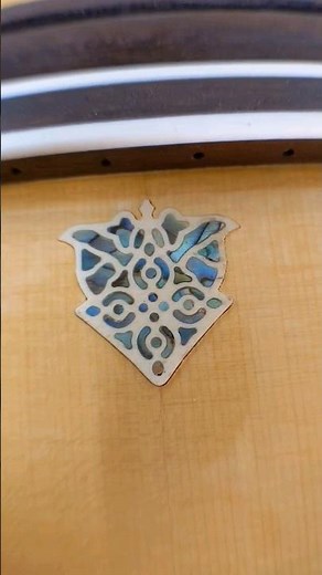 Mother of Pearl and Ivory inlay on an acoustic guitar #cnc