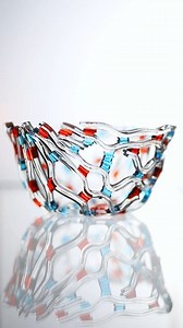 A new evolution of the glass netting technique- when structure meets chaos. . . . #glassart #glassartist #kilnformedglass #glassnetting #contemporarycraft #canadianglass #fusedglass #glasssculpture #artglas #fireandice #studioglass #glassbowl #handmadeart #moderncraft #texturedglass #moltenmagic | Artglas