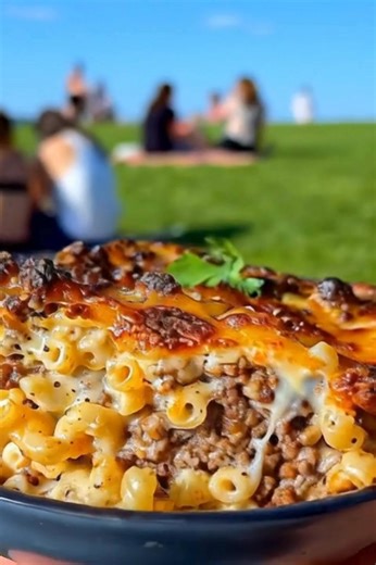 Baked Macaroni Beef Casserole Cheesy Baked Macaroni and Ground Beef Casserole with Creamy Layers and Golden Crust Ingredients: For the pasta layer: 300 g (10 oz) elbow macaroni 1 tbsp olive oil Salt for boiling water For the beef sauce: 2 tbsp olive oil 1 medium onion, finely chopped 3 garlic cloves, minced 500 g (1 lb) ground beef 1 can (400 g) crushed tomatoes 2 tbsp tomato paste 1 tsp paprika 1 tsp dried oregano ½ tsp chili flakes (optional) Salt and black pepper, to taste For the cheese sauc