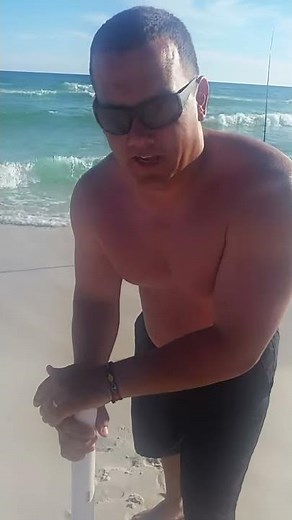 Surf fishing - Easy way to put your sand spike rod holder in the sand