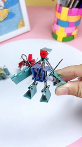 paper crafts creator on Instagram: "Title: Mini Binder Clip Robot #binderclipcraft #diyrobot #creativecraft #recycledart #funprojects #easycrafts #robotcraft #handmadeart #diyminiature #uniqueideas #binderclipdesign #diydecor #simplecraft #craftprojects #handmadeideas"