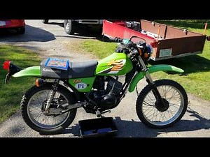 Doing the oil change on Michael's ke100