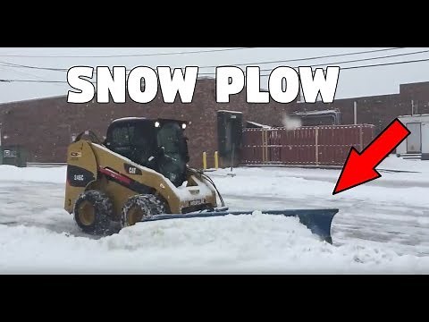 Cat 246C Skid Steer Plowing