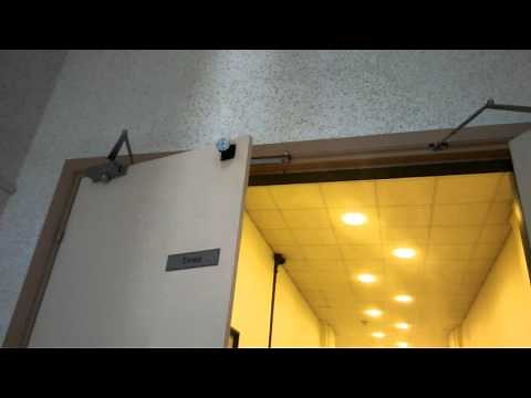 Processus intégral de fermeture d'une porte coupe-feu